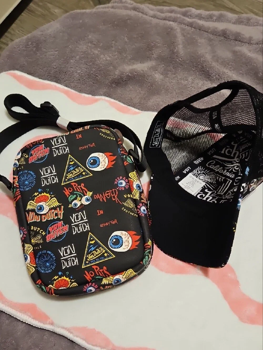 Von Dutch Black Crossbody Bag with Colorful Graphic Accents 2 Piece Bag And Hat